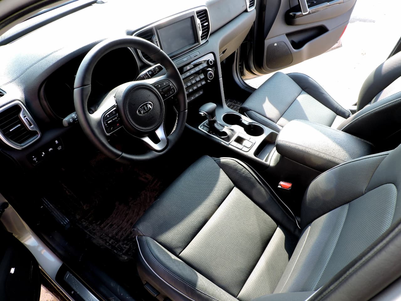 Экспресс-драйв Kia Sportage 2016: как выйти сухим из воды?