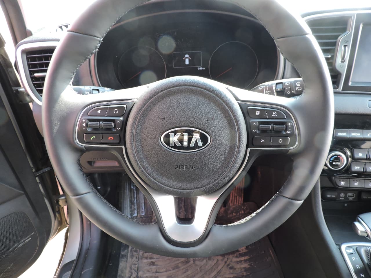 Экспресс-драйв Kia Sportage 2016: как выйти сухим из воды?