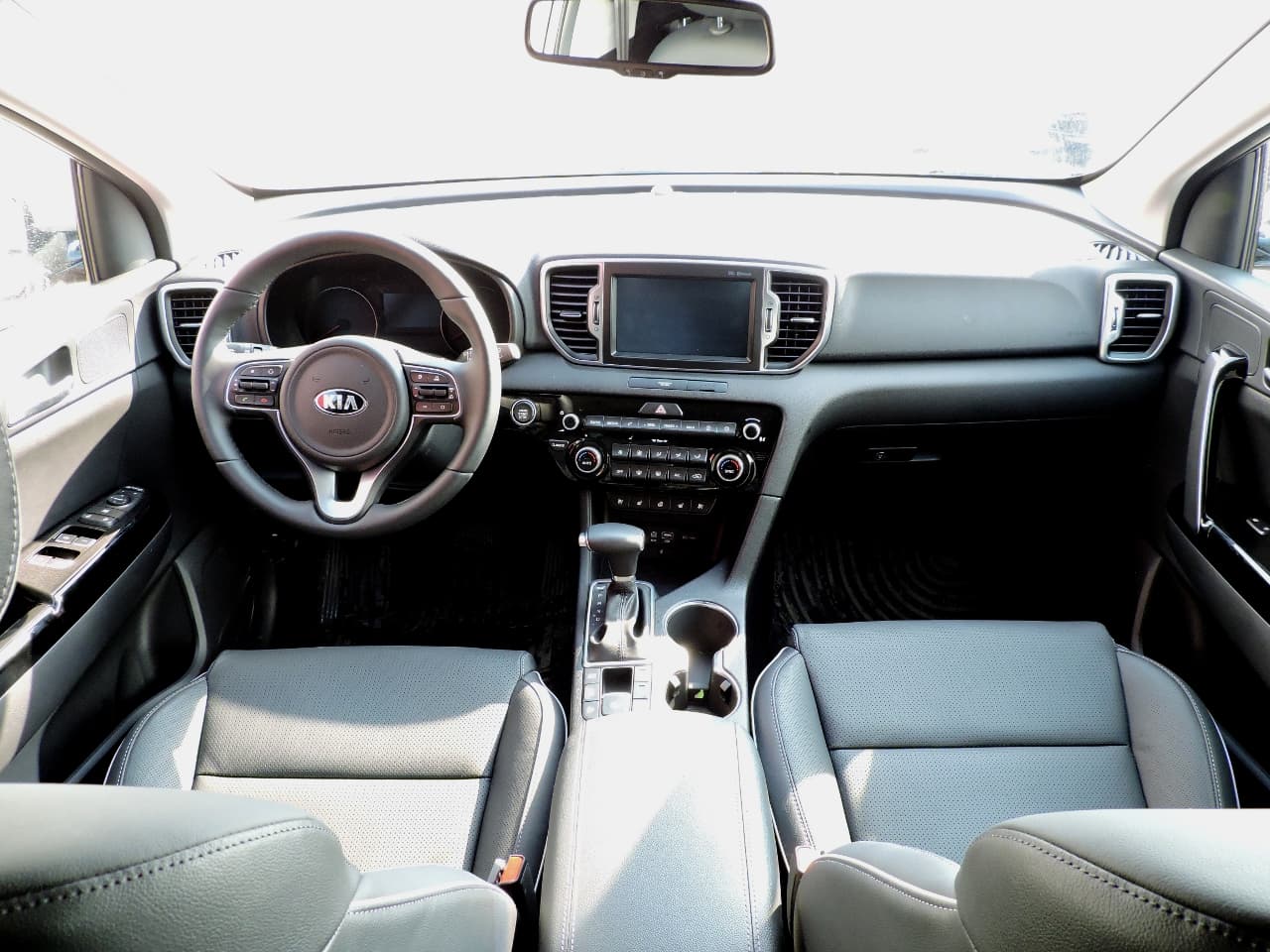 Экспресс-драйв Kia Sportage 2016: как выйти сухим из воды?