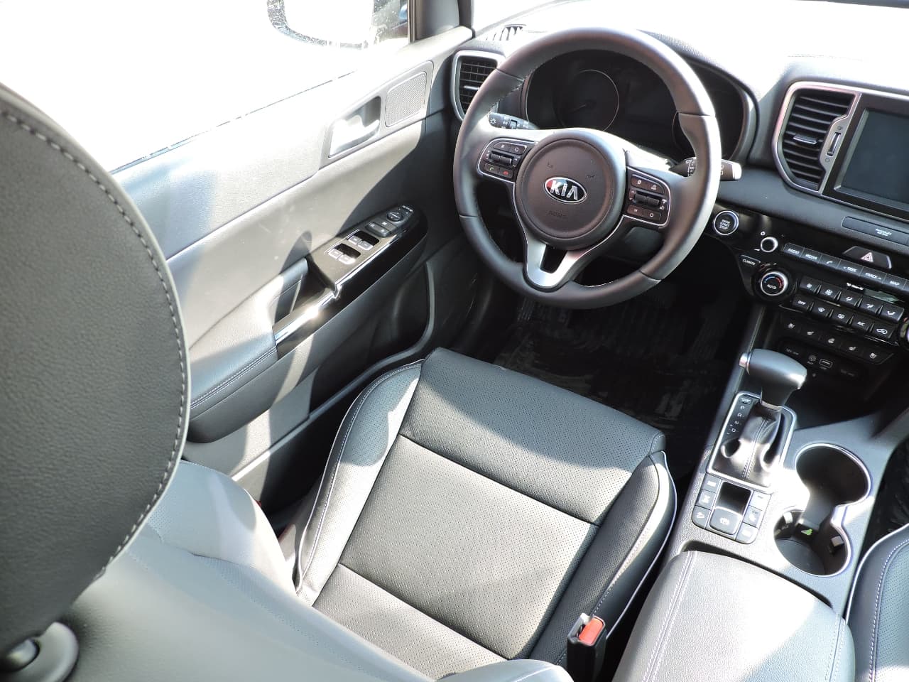 Экспресс-драйв Kia Sportage 2016: как выйти сухим из воды?