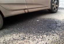 Ремонт дорог: щебень летит в стекла