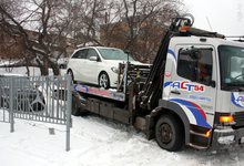 Уборка снега: водители даже не замечают, что их машину эвакуируют