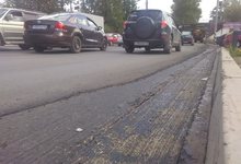 Мельничная покрылась новым асфальтом, но не полностью